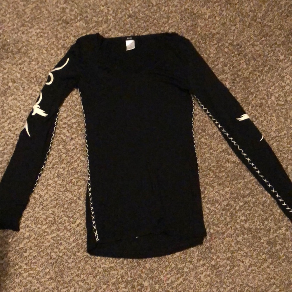 It’s a black long sleeve shirt that’s skins tight